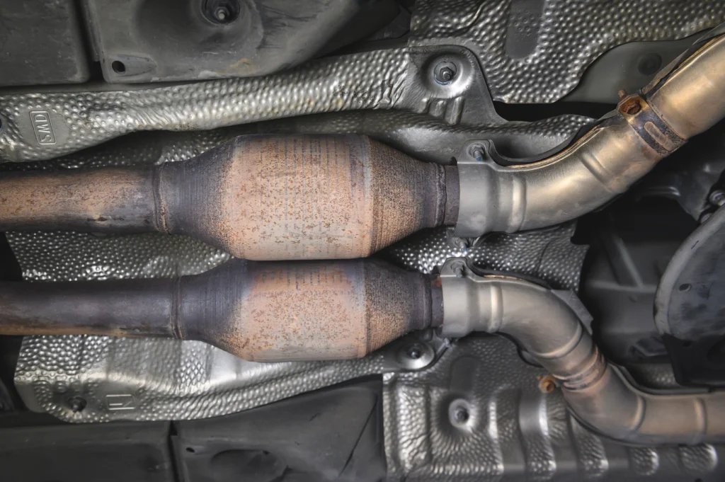 Two catalytic converters fitted in a car exhaust system