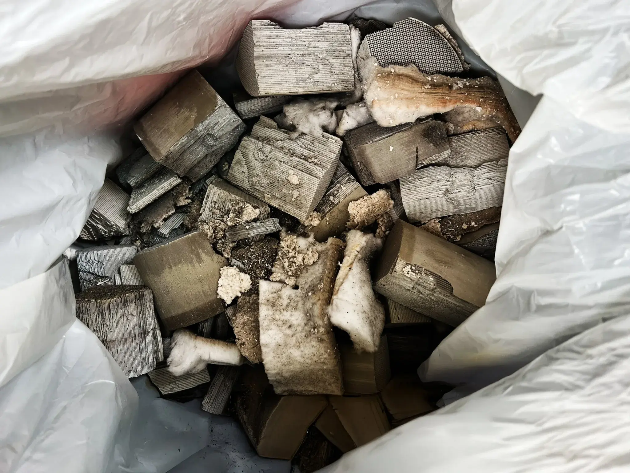 Bag of crushed auto catalyst ceramic honeycomb for recycling